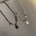 Black And White Little Ghost Monster Metal Chain Splicing Necklace For Men And Women, High End Niche Personality Temperament Clavicle Chain_ipsvogv.com