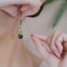 Women's earrings design green zircon earrings, feminine, simple retro bow earrings, versatile face-slimming earrings_ipsvogv.com
