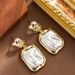 Fashionable And Exquisite Baroque Shaped Pearl Earrings, 2025 New Style, High-end Silver Needle Earrings_ipsvogv.com
