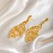 INS Light Luxury Metal Minimalist Style Gold-Plated Hollow Leaf Design Sense Drop Earrings For Women_ipsvogv.com