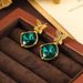 Qingdao jewelry emerald crystal micro inlaid zircon butterfly ethnic style women's earrings niche high-end feeling_ipsvogv.com
