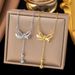 Titanium Steel Tassel Bow Necklace Women's Luxury Simple Advanced Versatile Lily Of The Valley Pendant Kwai_ipsvogv.com