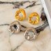 Hot Selling Real Gold Electroplated Titanium Steel Vintage Irregular Folds Black Hole Earrings_ipsvogv.com