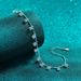 New Deyi Pure Silver Mosang Stone Plated With PT950 Gold Light Luxury Tassel Four Claw Bracelet Daily Elegance_ipsvogv.com