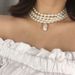 Elegant Layered Necklace with Ornaments, Women's Irregular Pearl Pendant, Versatile Beaded Neckchain Item_ipsvogv.com