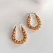 Spot Fashionable Niche Ins18k Gold Plated Titanium Steel Wave Horn Spring Earrings_ipsvogv.com