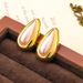 Exaggerated cold style metal large light surface water droplet pearl silver needle high-end female personality earrings_ipsvogv.com