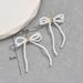 Fashion OL Bow Personalized Double layer Hollow Pearl Earrings Female Versatile Design Ear Bone Nails_ipsvogv.com