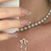 New Silver Slim Bowknot Necklace INS Internet Celebrity Niche Design Sweet Temperament Ribbon Fairy Collarbone Chain_ipsvogv.com