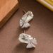 Exquisite Fashionable Zircon Bow With Diamond Inlay, Feminine Temperament, Simple And High-end Silver Needle Earrings_ipsvogv.com