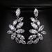 Cao Shi's Advanced Fashion Dinner Zircon Leaf Tassel Earrings with Versatile Style and Leaf Shape Earrings for Women_ipsvogv.com