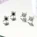 Black And White Titanium Steel Eight Pointed Star Earrings Inlaid With Zircon Star Design High Street Style Earrings For Men And Women_ipsvogv.com
