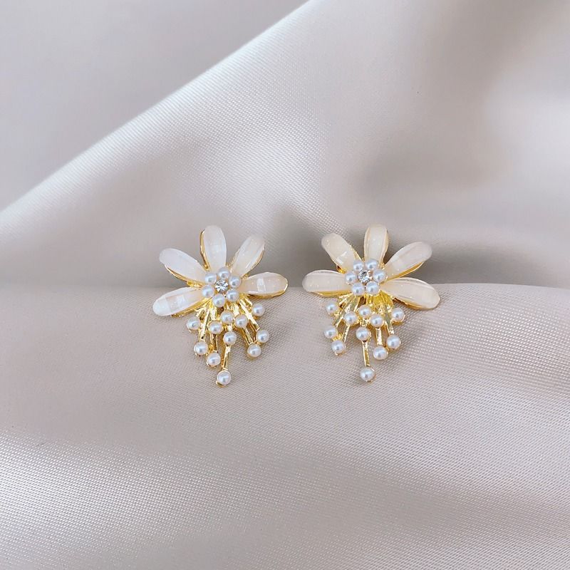 Korean flower pearl simple temperament unique niche high end design fairy earrings price adjustment_ipsvogv.com