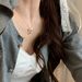 Korean Dongdaemun Sweet Metal Bow Ribbon Ins Style Electroplated Silver Necklace For Women_ipsvogv.com