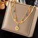 European and American cross-border retro stacking double-layer titanium steel chain blue turquoise round star feather pendant necklace_ipsvogv.com