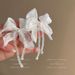 Unisex Super Fairy White Chiffon Romantic Crystal Bow Beaded Tassel Earrings Niche Design High End Temperament Earrings_ipsvogv.com