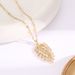 Fashionable and high-end titanium steel necklace with feather inlaid zircon ins for women's collarbone chain, gold_ipsvogv.com