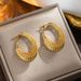 Lace O-shaped hollowed out female earr with cold and cool style titanium steel genuine gold plated pigment ring_ipsvogv.com