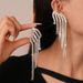 Light luxury style diamond-encrusted wing fringed integrated stud earrings and ear clips_ipsvogv.com