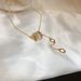 Korean Version Of Small Waist Necklace Women In 2023, New Niche High-end Collarbone Chain With Double Rings For Spring_ipsvogv.com