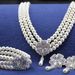 Wedding jewelry wholesale three-row pearl bridal jewelry set rhinestone four-leaf clover necklace and earrings three-piece set_ipsvogv.com