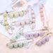 Colored pearl brooch waist circumference change pants waist waist artifact fixed clothes color pearl metal brooch_ipsvogv.com