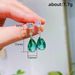 Cao Shi's Exquisite Sea Blue Treasure Color Crystal Zircon Summer New Product Light Luxury Pear Shaped Droplet Earrings_ipsvogv.com