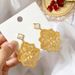 Women's Jewelry Hollow Flower Plate Earrings Retro Metal Earrings Exaggerated Artistic Fashionable White Shell Copper Electroplated Earrings_ipsvogv.com
