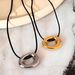 Unisex Autumn And Winter INS Gold Plated Titanium Steel Polished Circle Leather Rope Gold And Silver Necklace_ipsvogv.com