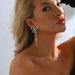 Unisex Light Luxury Claw Chain Full Diamond Butterfly Tassel Earrings Temperament Versatile Female Earrings_ipsvogv.com