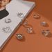 Alloy Chain Crying Face 9-piece Set Of Playing Card Hollow Heart Daisy Ring_ipsvogv.com