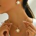 Geometric style women's long necklace set with personalized inlaid pearls, niche design earrings, versatile accessories_ipsvogv.com