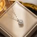 Advanced, personalized, compact, and fashionable rotating zircon four leaf flower necklace, light luxury and niche_ipsvogv.com