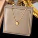 2023 New Small Pendant With Titanium Steel Gold-plated Light Luxury Striped Scallop Shell Texture Item_ipsvogv.com