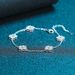 XDY Pure Silver Women's Light Luxury Versatile Style Chain With Five Flowers And Four Leaves Grass Micro Inlaid Mosonite_ipsvogv.com