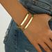 Light luxury style women's wristband with personalized inlaid pearls adjustable opening, featuring a niche flower design_ipsvogv.com