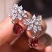 Cao Shimao's New Product Features Pear Shaped Red With Water Droplets Embedded. The Earrings Are Full Of Diamonds And_ipsvogv.com