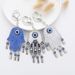 Creative Blue Eye Bag Pendant Devil's Eye Palm Metal Keychain Pendant_ipsvogv.com