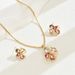 A niche Korean style women's earring and jewelry set with personalized inlaid water droplet geometric design, long_ipsvogv.com