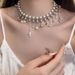 Sweet Cool Style Cross Double Layer Pearl Necklace Four Star Heavy Industry Exquisite High End Tassel Collarbone Chain_ipsvogv.com