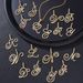 Station jewelry micro inlaid zircon cursive 26 English letter pendant hip hop necklace men and women_ipsvogv.com