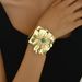 Light luxury style women's wristband with personalized inlaid pearls adjustable opening, featuring a niche flower design_ipsvogv.com