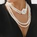 N12399 new multi-layer pearl camellia flower pendant necklace fashionable ins versatile long sweater chain_ipsvogv.com