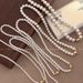 Light Luxury Strong Light Shijia Pearl Necklace 2024 New Magnetic Buckle Collarbone Women's Autumn And Winter Sweater_ipsvogv.com