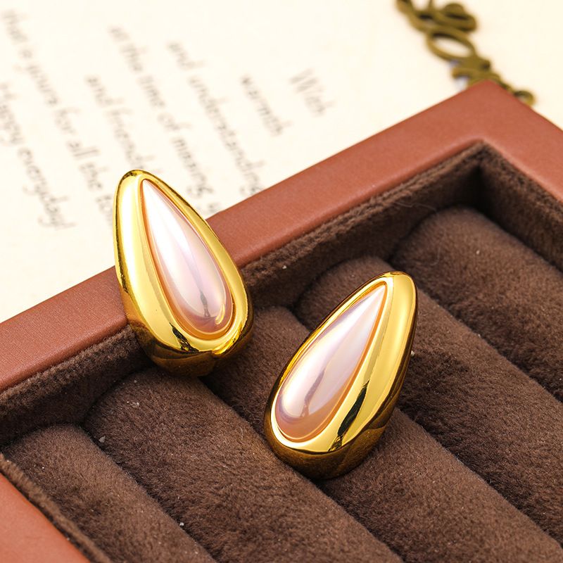 Exaggerated cold style metal large light surface water droplet pearl silver needle high-end female personality earrings_ipsvogv.com