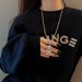 Cute full diamond stainless steel titanium steel bear necklace sweater chain high end female versatile long niche design pendant_ipsvogv.com
