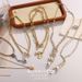 New Pearl Temperament Thick Chain Irregular Texture Tassel Long Bone Chain Necklace High End Fashion Clothing_ipsvogv.com