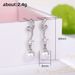 Cao Shi Synthetic Mother Shell Pearl Earrings Elegant and Exquisite Wave Pattern Earrings for Women's Long and Simple Earrings_ipsvogv.com