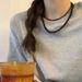 Pearl Spring 2023 New Black Agate Beaded Clavicle Chain French Sweater Necklace For Women_ipsvogv.com