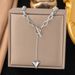 New Stainless Steel OT Buckle Heart Pendant Tassel Collarbone Chain Niche Luxury High-end Fashion Accessory_ipsvogv.com